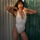 Natalie Lim Suarez - Breena White V Neck Swimsuit | Moeva | Swimsuit | Each week unveils new pieces—luxury swimwear, fluid resort silhouettes, and elevated summer-to-evening essentials designed to carry you from coastal escapes to city nights.