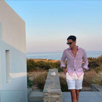 Model wearing the James Pink Linen Shirt with Marco White Shorts, exuding effortless summer elegance.
