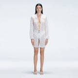 Althea White Long Sleeve Lace Mini Kaftan | Moeva | Beachwear Dresses | Each week unveils new pieces—luxury swimwear, fluid resort silhouettes, and elevated summer-to-evening essentials designed to carry you from coastal escapes to city nights.