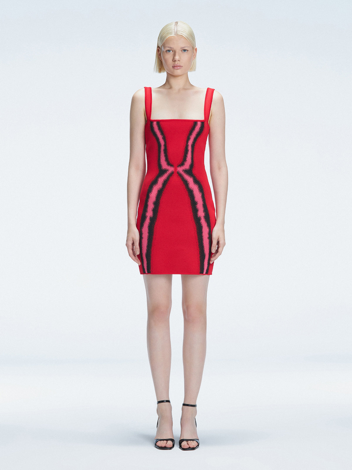 Model showcasing the Anais Red Degraded Dress, highlighting its stylish square neck and adjustable straps