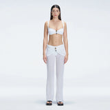 Angelique White High Waist Beach Pant | Moeva | Women Beachwear Pants | Each week unveils new pieces—luxury swimwear, fluid resort silhouettes, and elevated summer-to-evening essentials designed to carry you from coastal escapes to city nights.