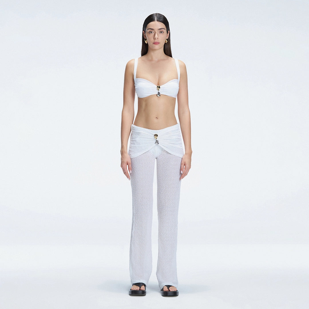 Angelique White High Waist Beach Pant | Moeva | Women Beachwear Pants | Each week unveils new pieces—luxury swimwear, fluid resort silhouettes, and elevated summer-to-evening essentials designed to carry you from coastal escapes to city nights.