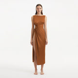 Apollo Brown Satin Sleeveless Long Dress with Side Slit | Moeva | RTW Dresses | Each week unveils new pieces—luxury swimwear, fluid resort silhouettes, and elevated summer-to-evening essentials designed to carry you from coastal escapes to city nights.
