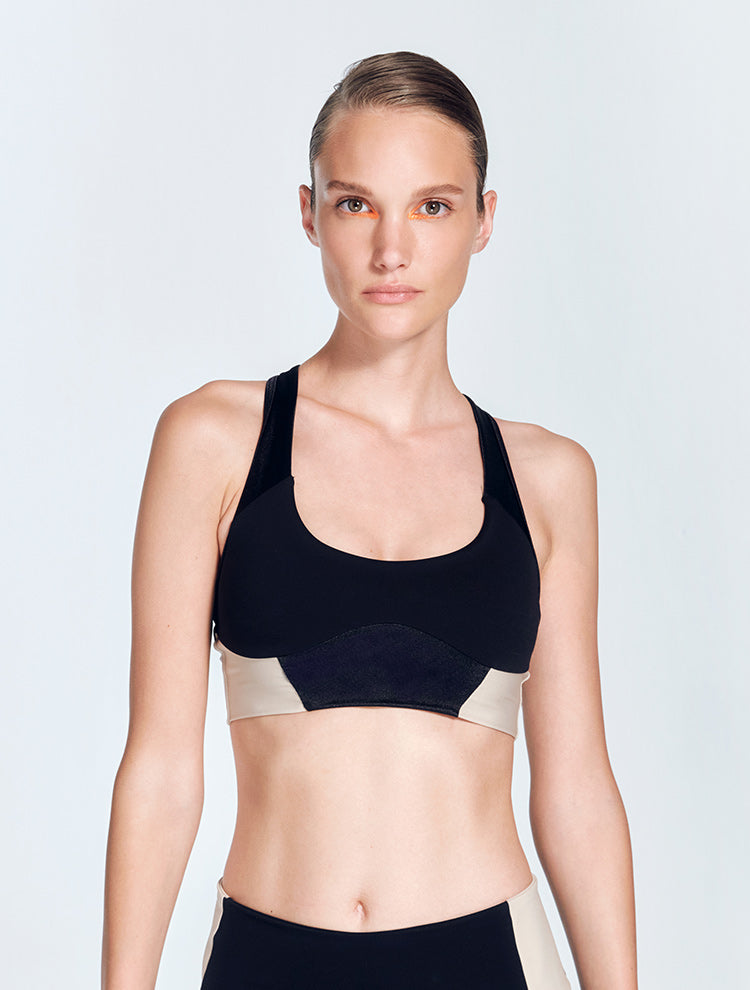 Arlette Black Sport Bra | Moeva | Sports Bras | Each week unveils new pieces—luxury swimwear, fluid resort silhouettes, and elevated summer-to-evening essentials designed to carry you from coastal escapes to city nights.