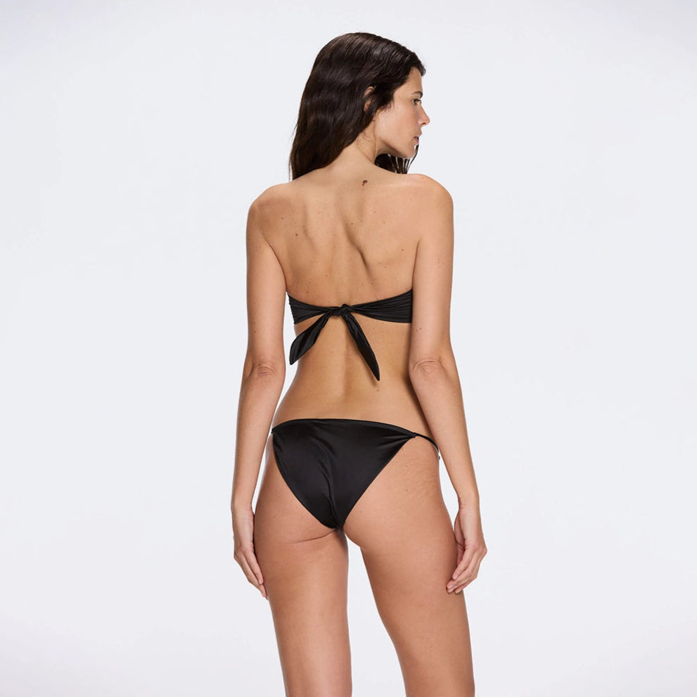 Astrid Bandeau Gold Detail Mid Coverage Satin Black Bikini Set | Moeva | Bikini Bottom | Each week unveils new pieces—luxury swimwear, fluid resort silhouettes, and elevated summer-to-evening essentials designed to carry you from coastal escapes to city nights.