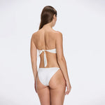 Astrid Bandeau Gold Detail Mid Coverage Satin White Bikini Set | Moeva | Bikini Bottom | Each week unveils new pieces—luxury swimwear, fluid resort silhouettes, and elevated summer-to-evening essentials designed to carry you from coastal escapes to city nights.