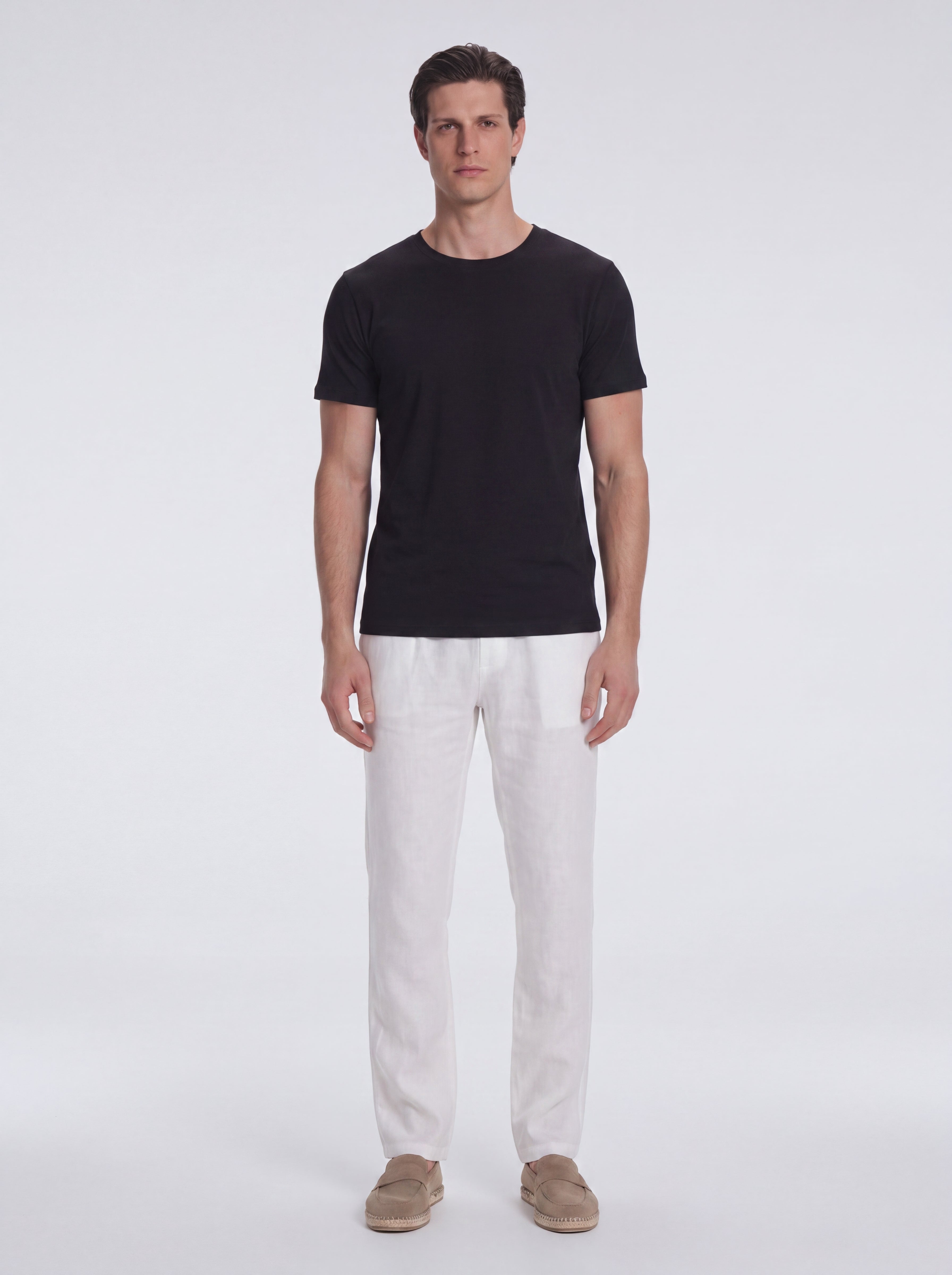 Atlas Black Cotton Round Neck T-Shirt | Moeva | T-Shirt | Each week unveils new pieces—luxury swimwear, fluid resort silhouettes, and elevated summer-to-evening essentials designed to carry you from coastal escapes to city nights.