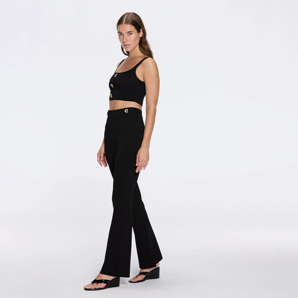 Aureline Black Knitted Scoop Neck Gold Buttoned Crop Top | Moeva | RTW Bustiers | Each week unveils new pieces—luxury swimwear, fluid resort silhouettes, and elevated summer-to-evening essentials designed to carry you from coastal escapes to city nights.
