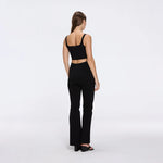 Aureline Top And Colette Knitted High Waist Black Pants Set | Moeva | RTW Bustiers | Each week unveils new pieces—luxury swimwear, fluid resort silhouettes, and elevated summer-to-evening essentials designed to carry you from coastal escapes to city nights.