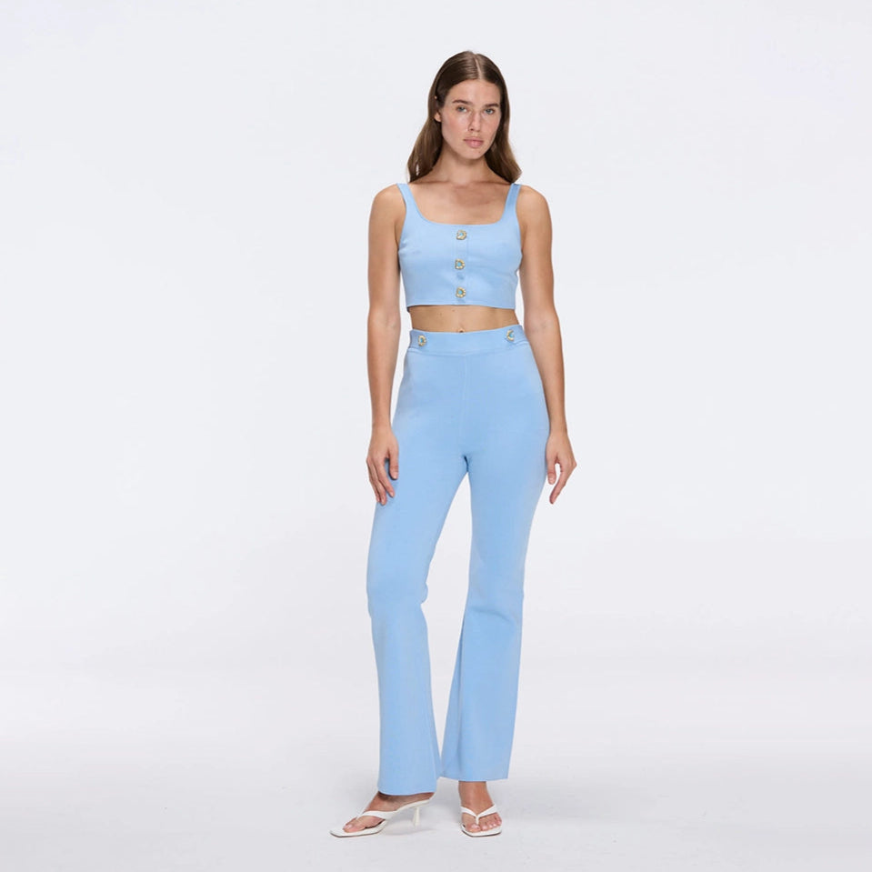 Aureline Top And Colette Knitted High Waist Pants Set Blue | Moeva | RTW Bustiers | Each week unveils new pieces—luxury swimwear, fluid resort silhouettes, and elevated summer-to-evening essentials designed to carry you from coastal escapes to city nights.