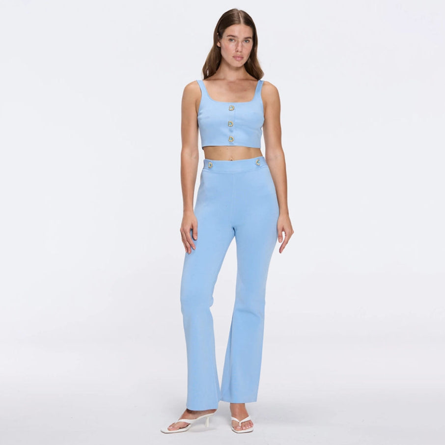 Colette Blue Knitted White High Waisted Wide-Leg Pants | Moeva | Women RTW Pants | Each week unveils new pieces—luxury swimwear, fluid resort silhouettes, and elevated summer-to-evening essentials designed to carry you from coastal escapes to city nights.