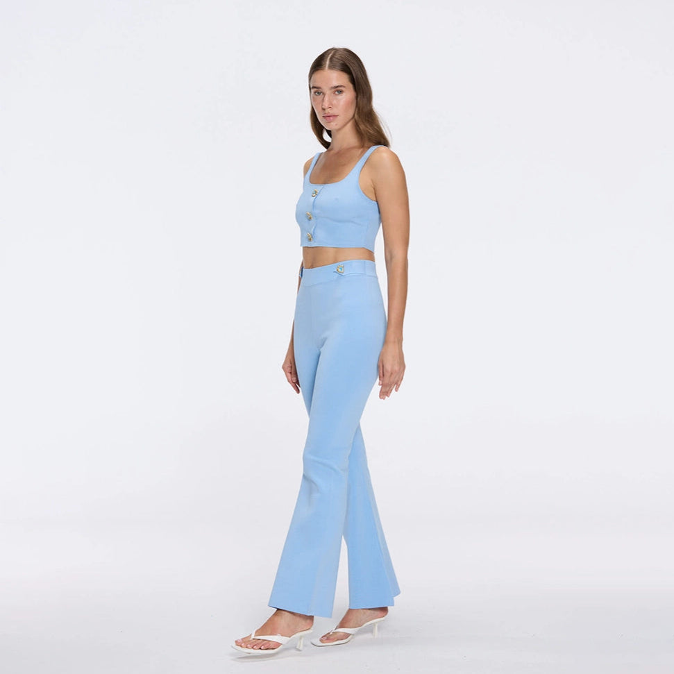 Aureline Top And Colette Knitted High Waist Pants Set Blue | Moeva | RTW Bustiers | Each week unveils new pieces—luxury swimwear, fluid resort silhouettes, and elevated summer-to-evening essentials designed to carry you from coastal escapes to city nights.