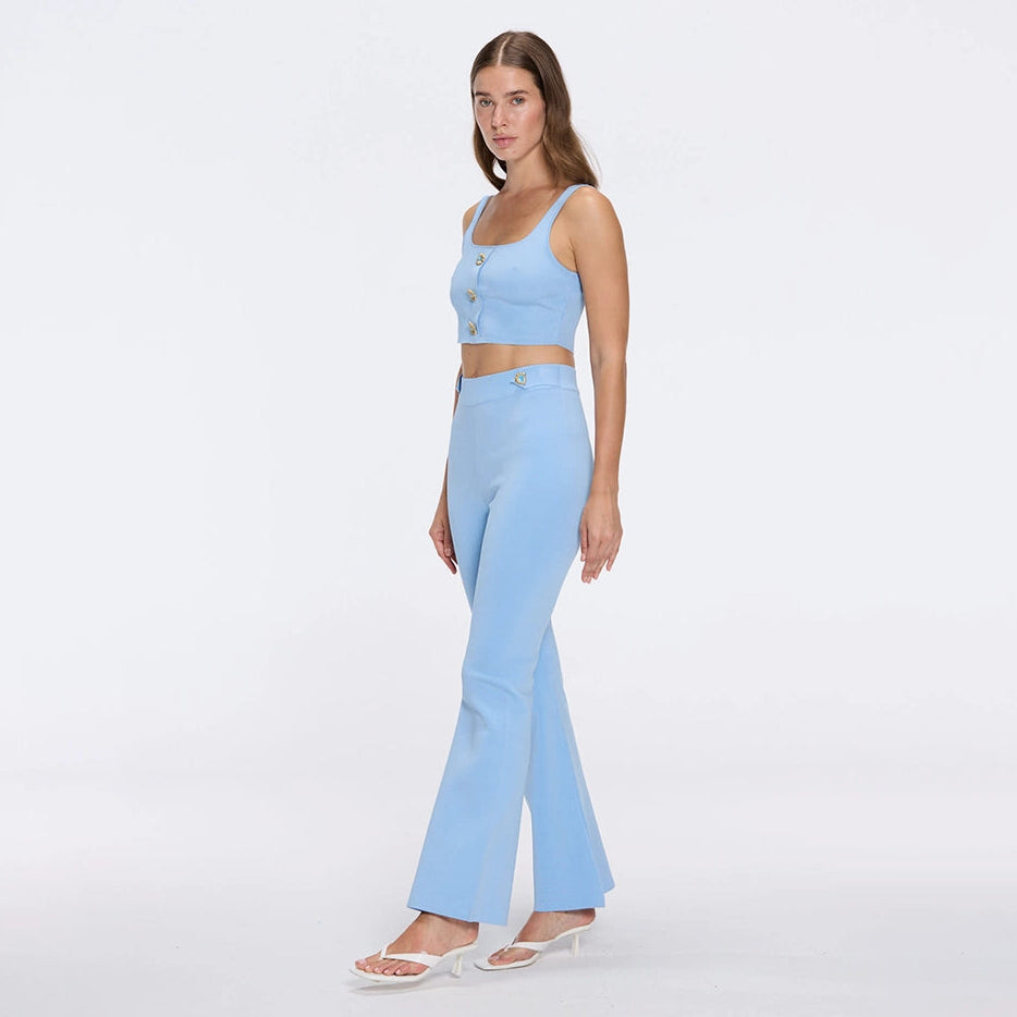 Colette Blue Knitted White High Waisted Wide-Leg Pants | Moeva | Women RTW Pants | Each week unveils new pieces—luxury swimwear, fluid resort silhouettes, and elevated summer-to-evening essentials designed to carry you from coastal escapes to city nights.