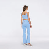 Colette Blue Knitted White High Waisted Wide-Leg Pants | Moeva | Women RTW Pants | Each week unveils new pieces—luxury swimwear, fluid resort silhouettes, and elevated summer-to-evening essentials designed to carry you from coastal escapes to city nights.
