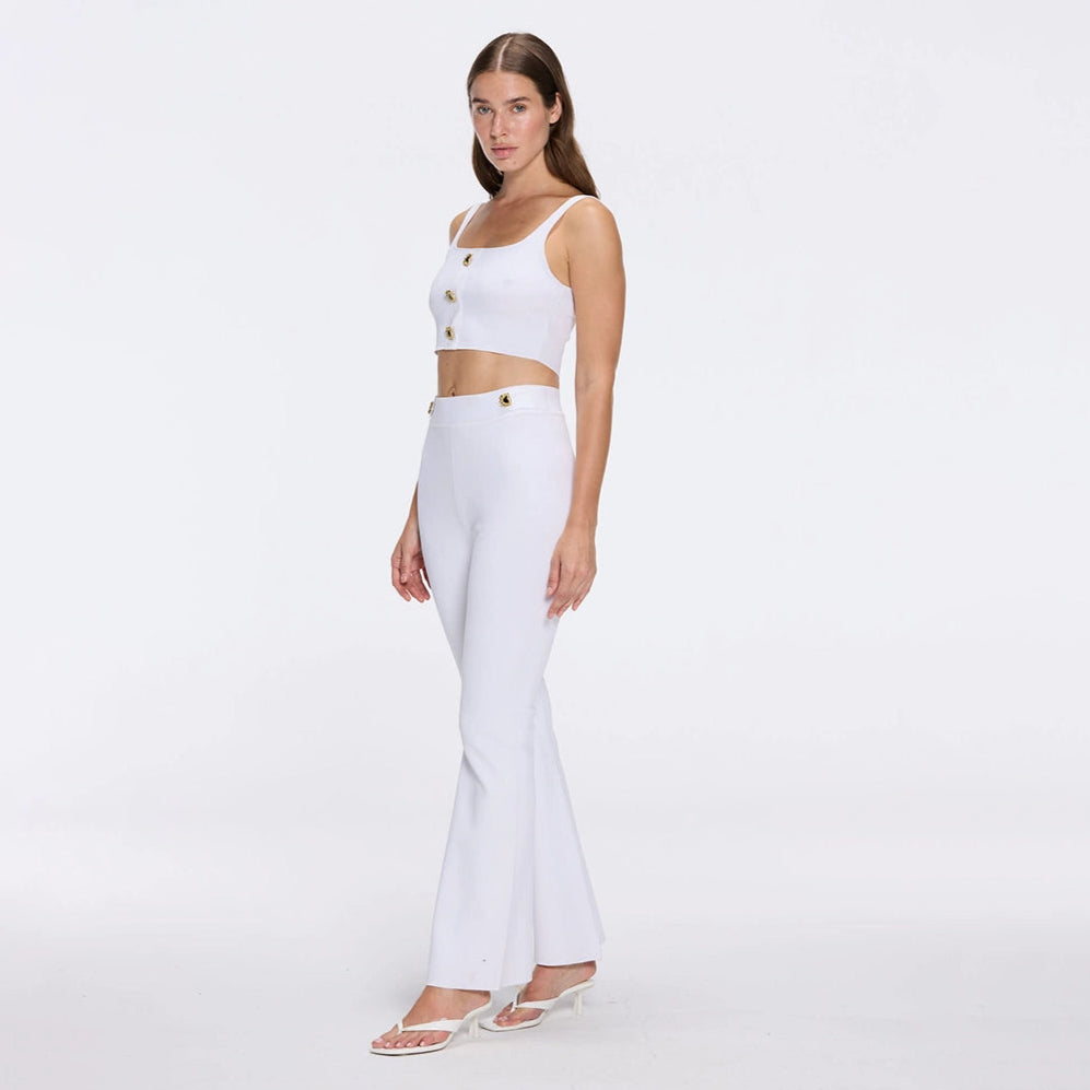 Aureline Top And Colette Knitted High Waist White Pants Set | Moeva | RTW Bustiers | Each week unveils new pieces—luxury swimwear, fluid resort silhouettes, and elevated summer-to-evening essentials designed to carry you from coastal escapes to city nights.
