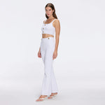 Aureline Top And Colette Knitted High Waist White Pants Set | Moeva | RTW Bustiers | Each week unveils new pieces—luxury swimwear, fluid resort silhouettes, and elevated summer-to-evening essentials designed to carry you from coastal escapes to city nights.