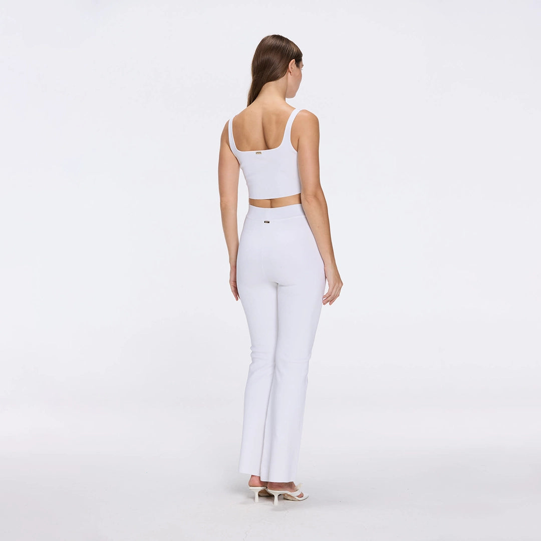 Aureline Top And Colette Knitted High Waist White Pants Set | Moeva | RTW Bustiers | Each week unveils new pieces—luxury swimwear, fluid resort silhouettes, and elevated summer-to-evening essentials designed to carry you from coastal escapes to city nights.