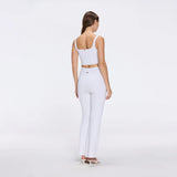Aureline Top And Colette Knitted High Waist White Pants Set | Moeva | RTW Bustiers | Each week unveils new pieces—luxury swimwear, fluid resort silhouettes, and elevated summer-to-evening essentials designed to carry you from coastal escapes to city nights.