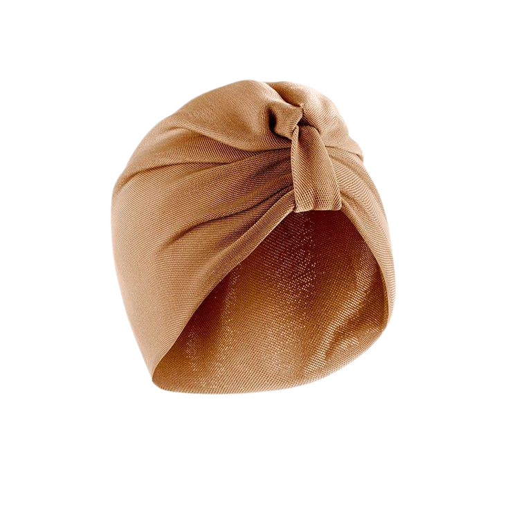 Noor Bronze Turban | Moeva | Turban | Each week unveils new pieces—luxury swimwear, fluid resort silhouettes, and elevated summer-to-evening essentials designed to carry you from coastal escapes to city nights.