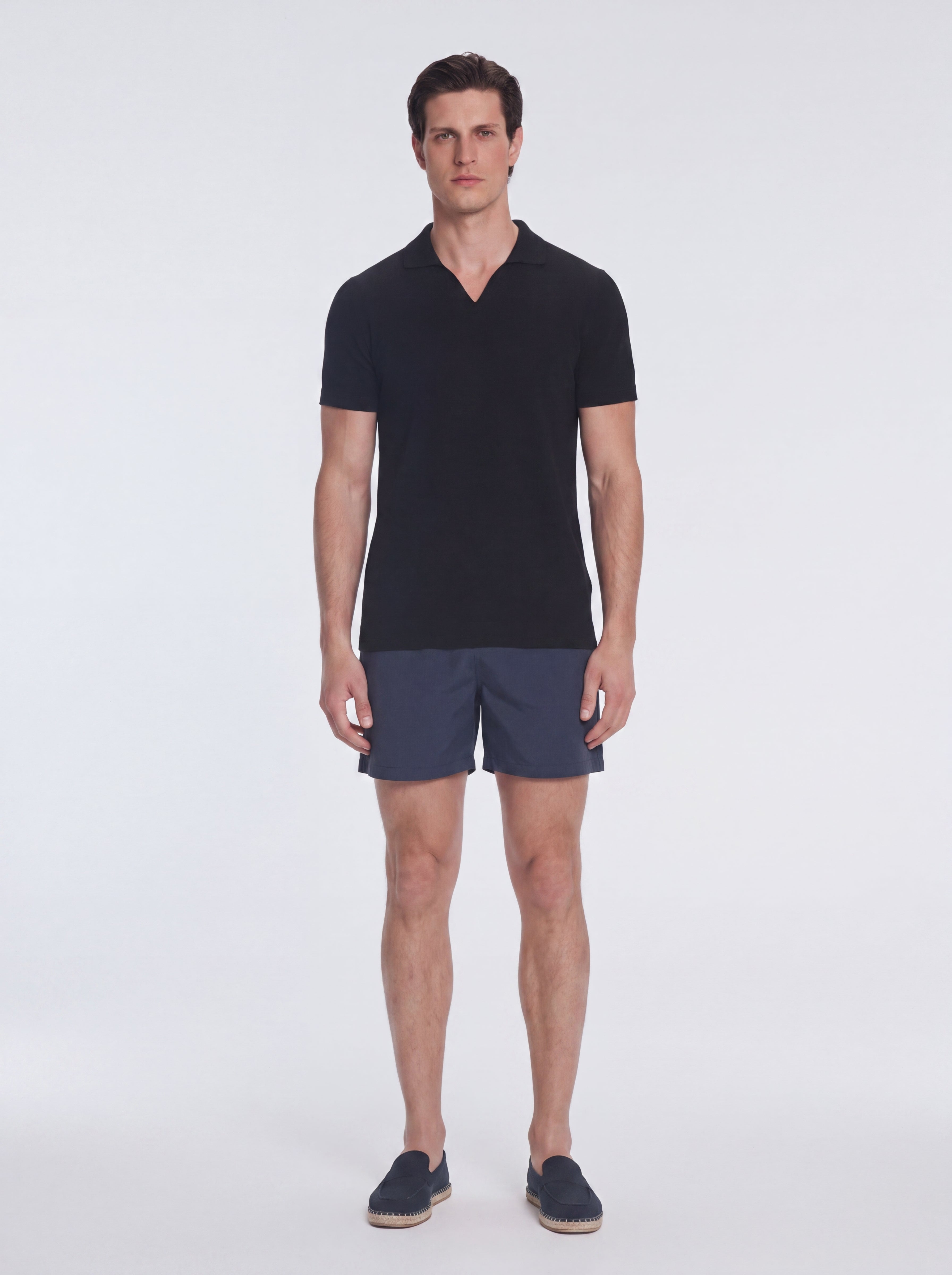 Atticus Black V-Neck Polo T-Shirt | Moeva | T-Shirt | Each week unveils new pieces—luxury swimwear, fluid resort silhouettes, and elevated summer-to-evening essentials designed to carry you from coastal escapes to city nights.