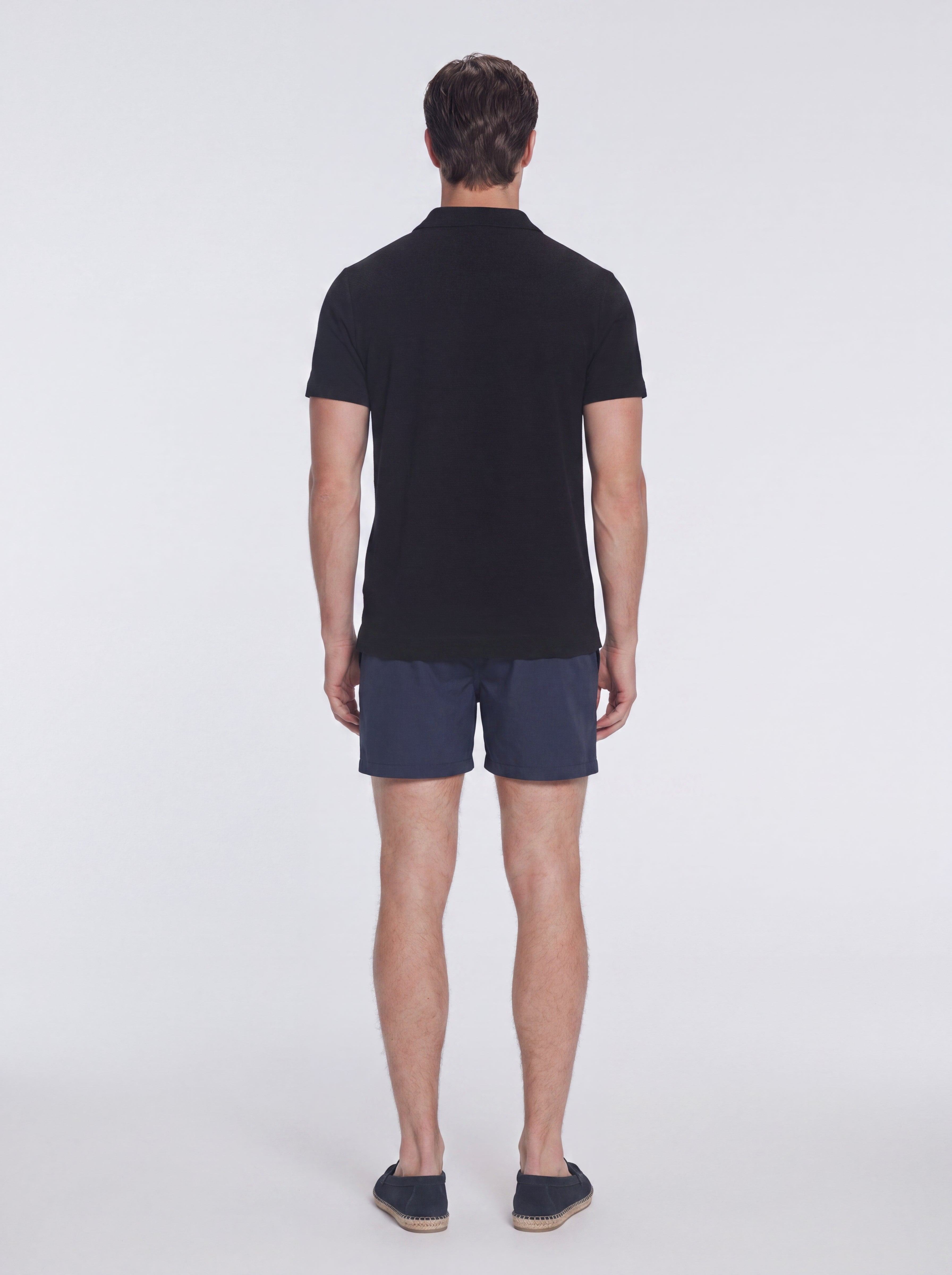 Atticus Black V-Neck Polo T-Shirt | Moeva | T-Shirt | Each week unveils new pieces—luxury swimwear, fluid resort silhouettes, and elevated summer-to-evening essentials designed to carry you from coastal escapes to city nights.