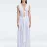 Front view of model wearing Aveline White Maxi Vest with front tie closure and sleeveless design.
