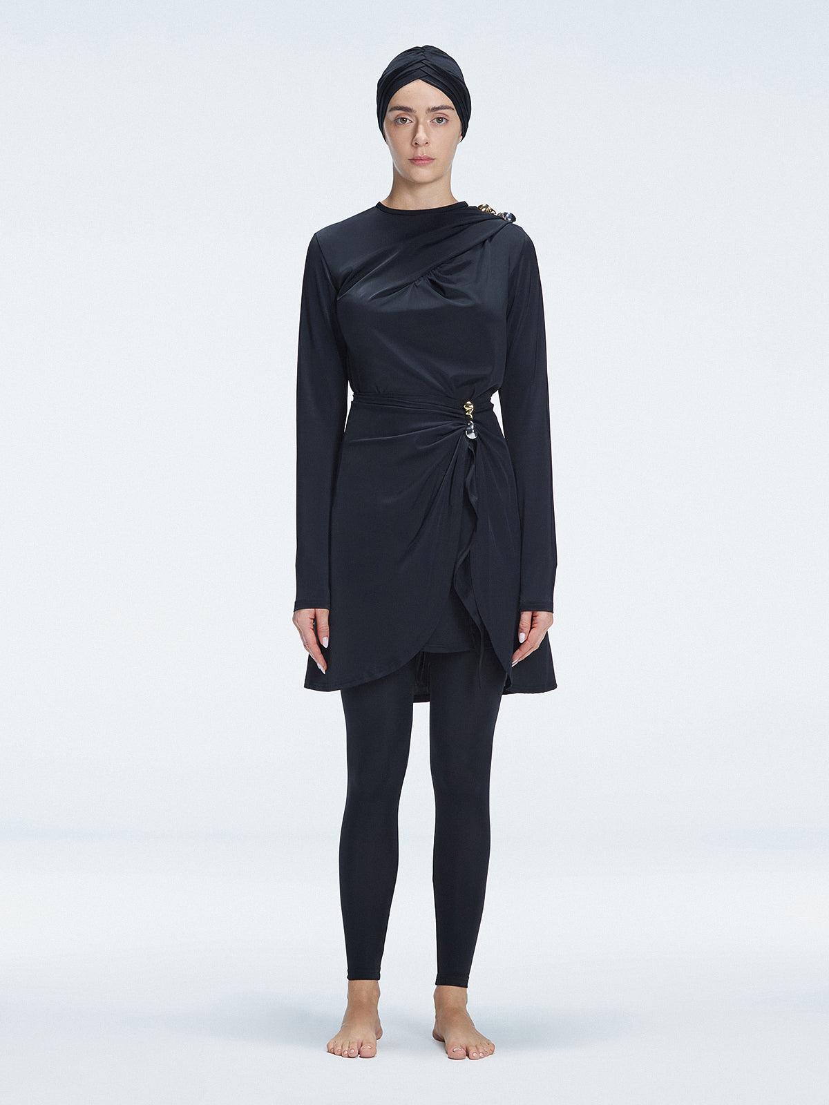 Azra Black Long Sleeve Accessorised Modest Swim Set | Moeva | Swimsuit | Each week unveils new pieces—luxury swimwear, fluid resort silhouettes, and elevated summer-to-evening essentials designed to carry you from coastal escapes to city nights.