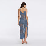 Beaulieu Blue Metallic Knit Maxi Dress with V-Neckline and Side Slit | Moeva | Dress | Each week unveils new pieces—luxury swimwear, fluid resort silhouettes, and elevated summer-to-evening essentials designed to carry you from coastal escapes to city nights.