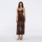 Beaulieu Brown Metallic Knit Maxi Dress with V-Neckline and Side Slit | Moeva | Dress | Each week unveils new pieces—luxury swimwear, fluid resort silhouettes, and elevated summer-to-evening essentials designed to carry you from coastal escapes to city nights.