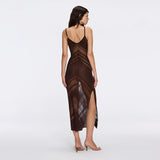 Beaulieu Brown Metallic Knit Maxi Dress with V-Neckline and Side Slit | Moeva | Dress | Each week unveils new pieces—luxury swimwear, fluid resort silhouettes, and elevated summer-to-evening essentials designed to carry you from coastal escapes to city nights.