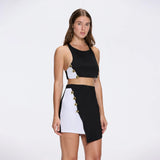 Bodrum Crop Top And Riviera Black-White Asymmetric Mini Skort Set | Moeva | RTW Bustiers | Each week unveils new pieces—luxury swimwear, fluid resort silhouettes, and elevated summer-to-evening essentials designed to carry you from coastal escapes to city nights.