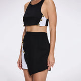 Bodrum Crop Top And Riviera Black-White Asymmetric Mini Skort Set | Moeva | RTW Bustiers | Each week unveils new pieces—luxury swimwear, fluid resort silhouettes, and elevated summer-to-evening essentials designed to carry you from coastal escapes to city nights.