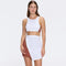 Bodrum White-Brown Duo-Colored Enamel Button Top | Moeva | RTW Bustiers | Each week unveils new pieces—luxury swimwear, fluid resort silhouettes, and elevated summer-to-evening essentials designed to carry you from coastal escapes to city nights.