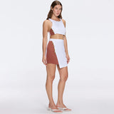 Bodrum Crop Top And Riviera White-Brown Asymmetric Mini Skort Set | Moeva | RTW Bustiers | Each week unveils new pieces—luxury swimwear, fluid resort silhouettes, and elevated summer-to-evening essentials designed to carry you from coastal escapes to city nights.