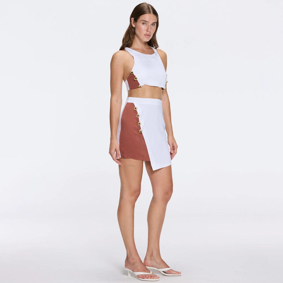 Bodrum White-Brown Duo-Colored Enamel Button Top | Moeva | RTW Bustiers | Each week unveils new pieces—luxury swimwear, fluid resort silhouettes, and elevated summer-to-evening essentials designed to carry you from coastal escapes to city nights.
