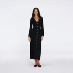 Brezia Black Knitted Maxi Dress with Long Sleeves and Gold Button Details | Moeva | RTW Dresses | Each week unveils new pieces—luxury swimwear, fluid resort silhouettes, and elevated summer-to-evening essentials designed to carry you from coastal escapes to city nights.