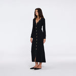 Brezia Black Knitted Maxi Dress with Long Sleeves and Gold Button Details | Moeva | RTW Dresses | Each week unveils new pieces—luxury swimwear, fluid resort silhouettes, and elevated summer-to-evening essentials designed to carry you from coastal escapes to city nights.