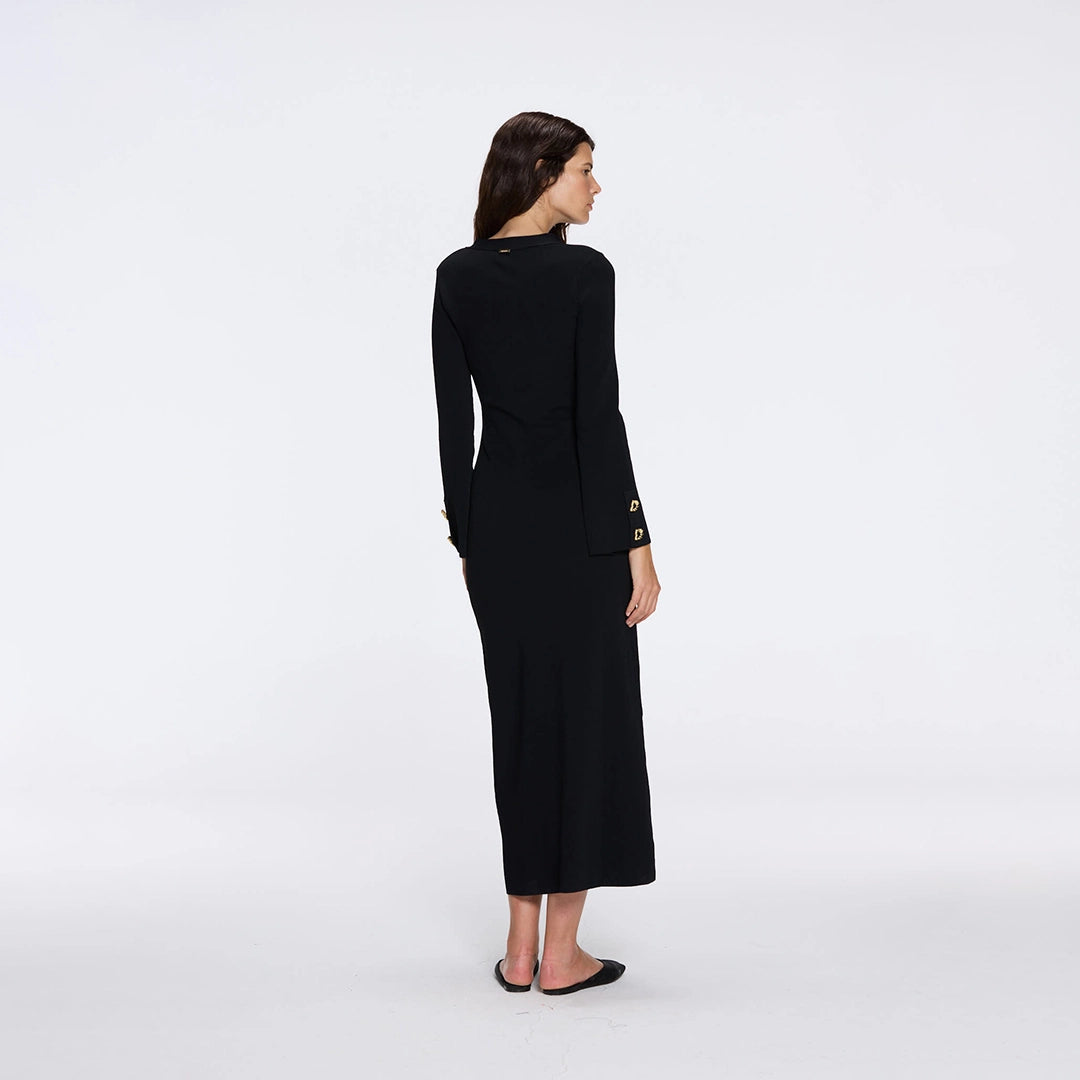 Brezia Black Knitted Maxi Dress with Long Sleeves and Gold Button Details | Moeva | RTW Dresses | Each week unveils new pieces—luxury swimwear, fluid resort silhouettes, and elevated summer-to-evening essentials designed to carry you from coastal escapes to city nights.