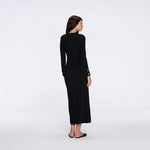 Brezia Black Knitted Maxi Dress with Long Sleeves and Gold Button Details | Moeva | RTW Dresses | Each week unveils new pieces—luxury swimwear, fluid resort silhouettes, and elevated summer-to-evening essentials designed to carry you from coastal escapes to city nights.