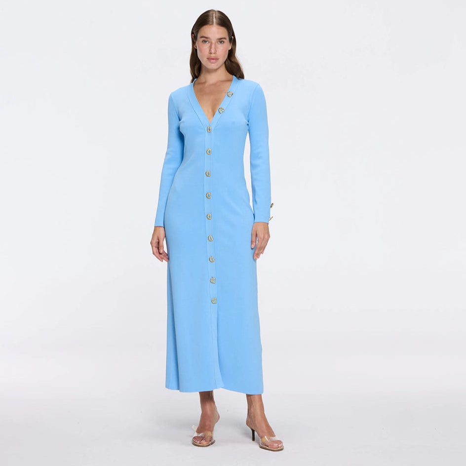 Brezia Blue Knitted Maxi Dress with Long Sleeves and Gold Button Details | Moeva | RTW Dresses | Each week unveils new pieces—luxury swimwear, fluid resort silhouettes, and elevated summer-to-evening essentials designed to carry you from coastal escapes to city nights.