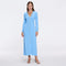 Brezia Blue Knitted Maxi Dress with Long Sleeves and Gold Button Details | Moeva | RTW Dresses | Each week unveils new pieces—luxury swimwear, fluid resort silhouettes, and elevated summer-to-evening essentials designed to carry you from coastal escapes to city nights.