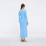 Brezia Blue Knitted Maxi Dress with Long Sleeves and Gold Button Details | Moeva | RTW Dresses | Each week unveils new pieces—luxury swimwear, fluid resort silhouettes, and elevated summer-to-evening essentials designed to carry you from coastal escapes to city nights.
