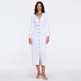 Brezia White Knitted Maxi Dress with Long Sleeves and Gold Button Details | Moeva | RTW Dresses | Each week unveils new pieces—luxury swimwear, fluid resort silhouettes, and elevated summer-to-evening essentials designed to carry you from coastal escapes to city nights.