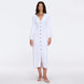 Brezia White Knitted Maxi Dress with Long Sleeves and Gold Button Details | Moeva | RTW Dresses | Each week unveils new pieces—luxury swimwear, fluid resort silhouettes, and elevated summer-to-evening essentials designed to carry you from coastal escapes to city nights.