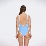 Brie V Neck Button Detail Blue Swimsuit | Moeva | Swimsuit | Each week unveils new pieces—luxury swimwear, fluid resort silhouettes, and elevated summer-to-evening essentials designed to carry you from coastal escapes to city nights.