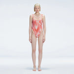 Calista Red Plunge Scoop Neck Swimsuit | Moeva | One-Piece | Each week unveils new pieces—luxury swimwear, fluid resort silhouettes, and elevated summer-to-evening essentials designed to carry you from coastal escapes to city nights.