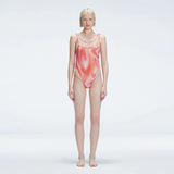 Calista Red Plunge Scoop Neck Swimsuit | Moeva | One-Piece | Each week unveils new pieces—luxury swimwear, fluid resort silhouettes, and elevated summer-to-evening essentials designed to carry you from coastal escapes to city nights.