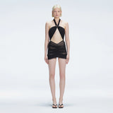 Carolina Black Cut-Out Halter Swimdress | Moeva | One-Piece | Each week unveils new pieces—luxury swimwear, fluid resort silhouettes, and elevated summer-to-evening essentials designed to carry you from coastal escapes to city nights.