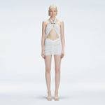Carolina White Cut-Out Halter Swimdress | Moeva | One-Piece | Each week unveils new pieces—luxury swimwear, fluid resort silhouettes, and elevated summer-to-evening essentials designed to carry you from coastal escapes to city nights.