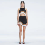 Lydia Black Optical Knit Mini Skirt | Moeva | Skirt | Each week unveils new pieces—luxury swimwear, fluid resort silhouettes, and elevated summer-to-evening essentials designed to carry you from coastal escapes to city nights.